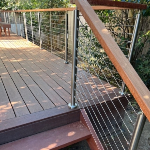 Round Posts in Satin Finish with a hardwood handrail